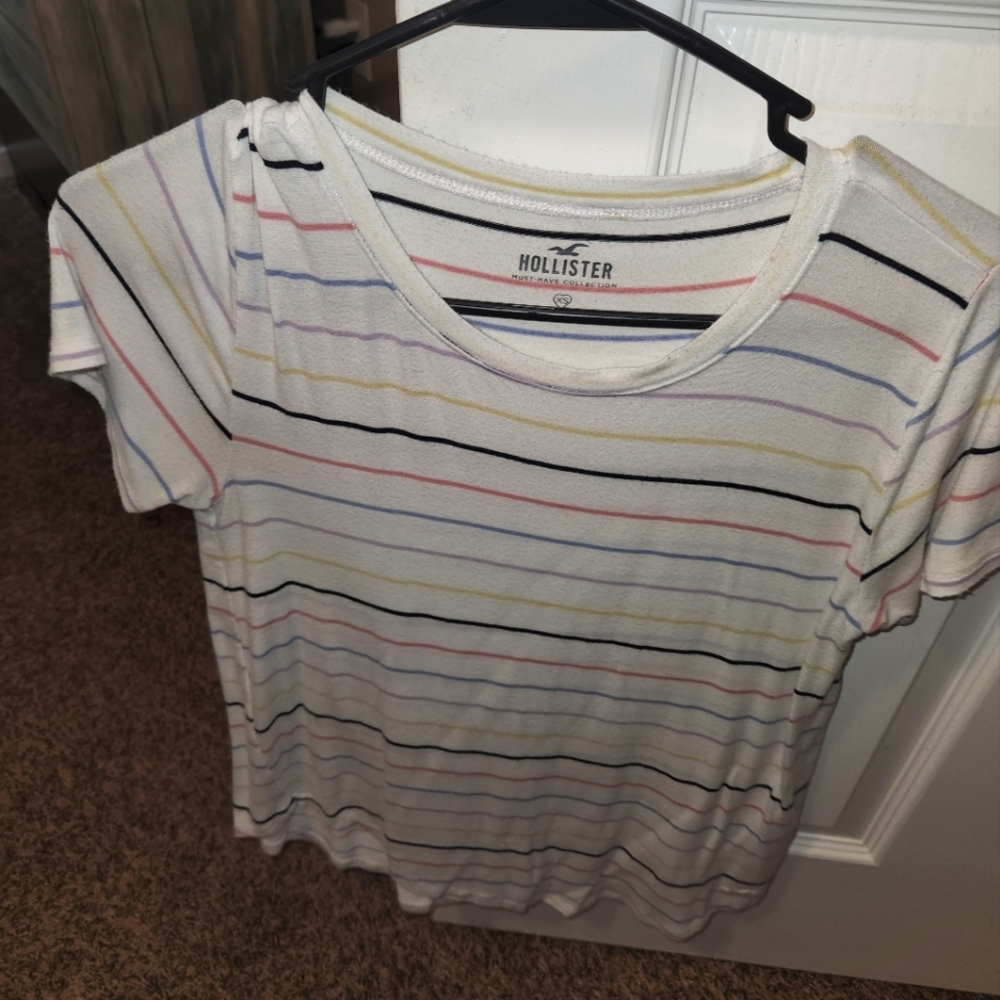 Hollister Tee, size XS off white with multi color stripes
